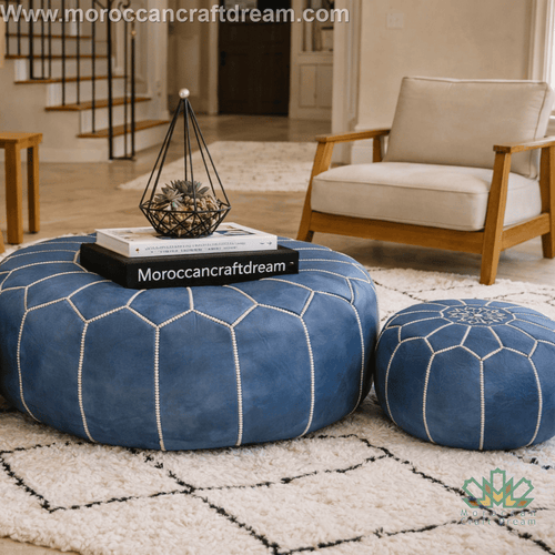 Handmade blue Moroccan leather ottoman coffee table and pouf in a boho living room